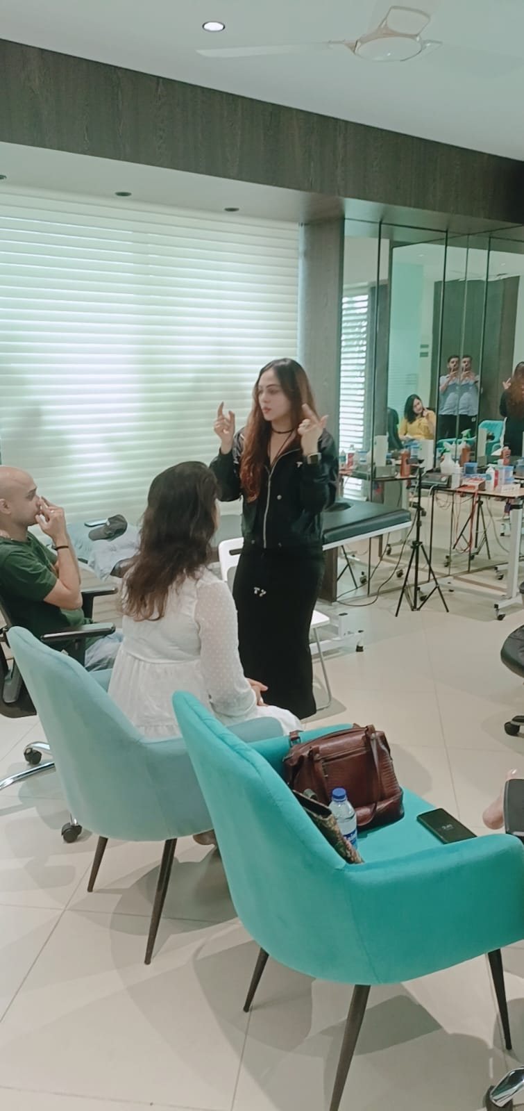 Vibha Jain explaining OCD symptoms during a session