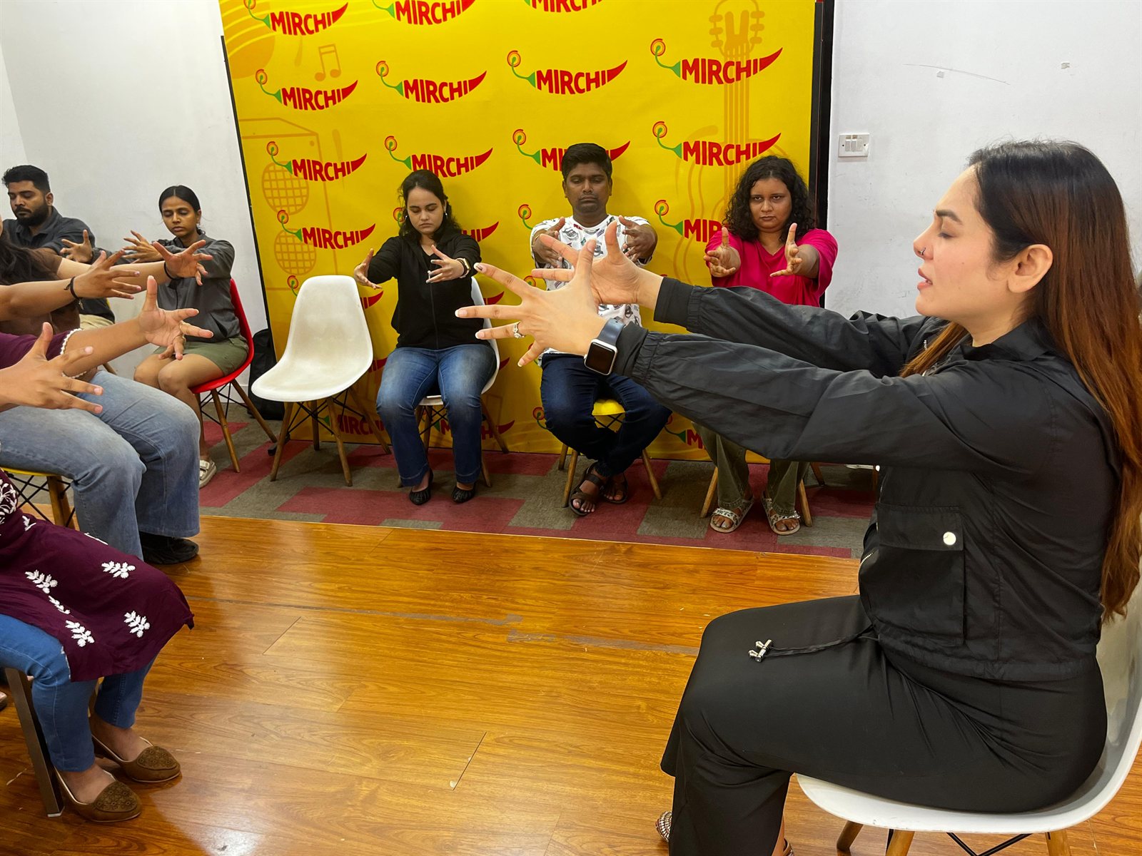 Vibha Jain leading a calming group relaxation and mindfulness workshop